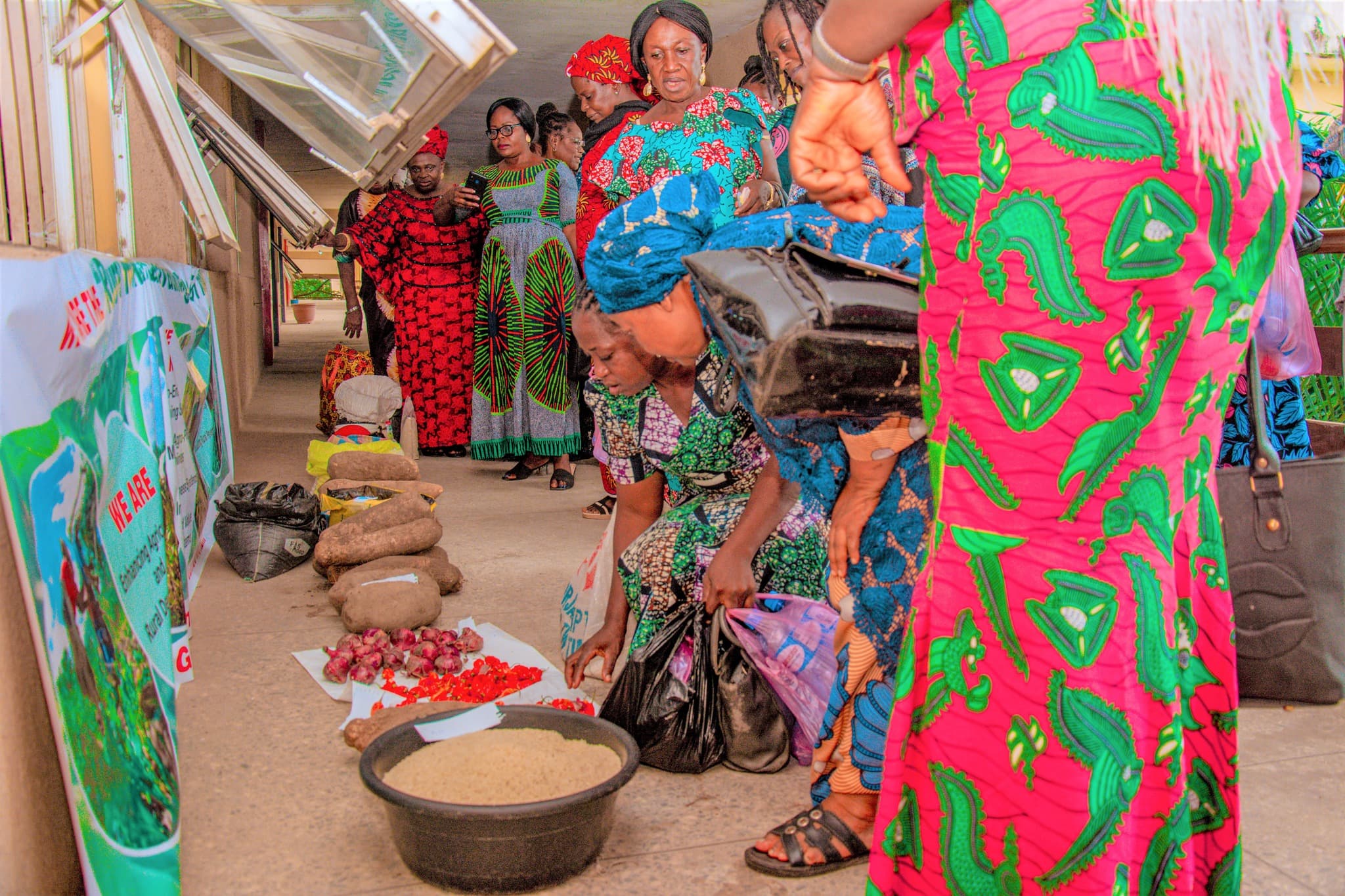 Women proudly selling fresh produce at a vibrant local market